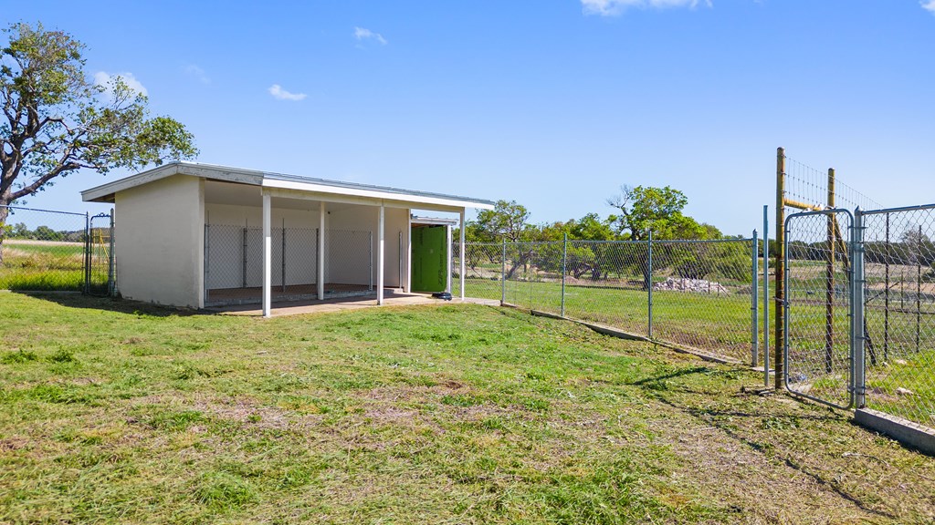 784 Ranch Road 2721 Johnson City, TX 78636 - Photo 19 of 20 a view of a house with backyard and porch