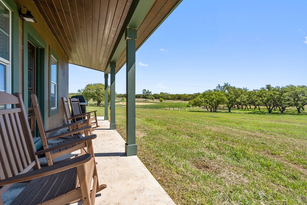784 Ranch Road 2721 Johnson City, TX 78636 - Photo 4 of 20 a garden view with a lake view