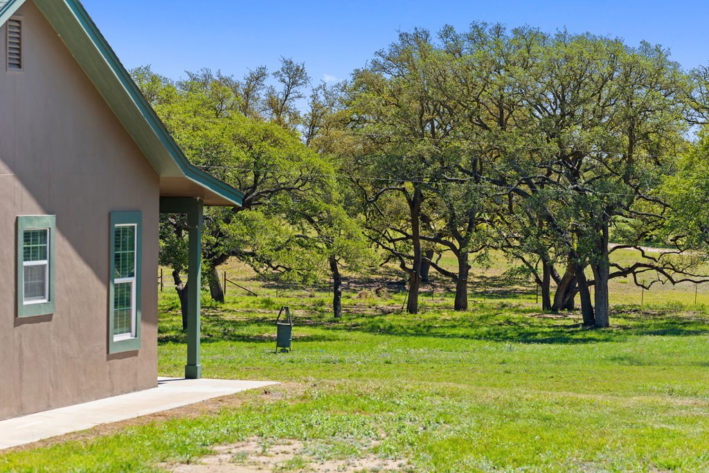 784 Ranch Road 2721 Johnson City, TX 78636 - Photo 7 of 20 a view of a house with a yard