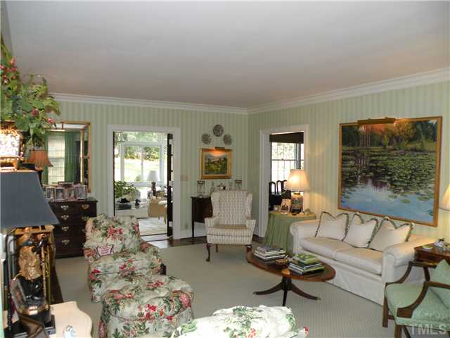 2528 York Road Raleigh, NC 27608 - Photo 4 of 12 a living room with furniture and wooden floor