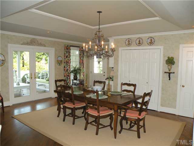 2528 York Road Raleigh, NC 27608 - Photo 8 of 12 a view of a dining room with furniture and wooden floor