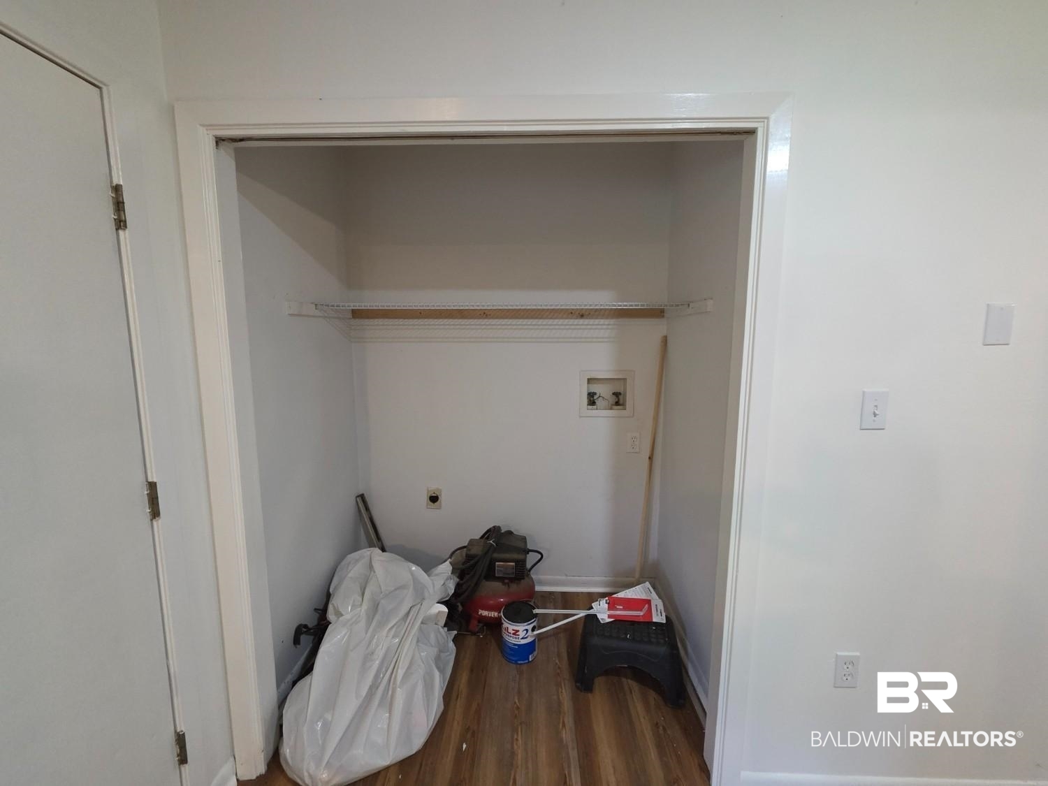 106 West 16th Street Bay Minette, AL 36507 - Photo 8 of 19 Washroom featuring hookup for a washing machine, hookup for an electric dryer, and wood finished floors