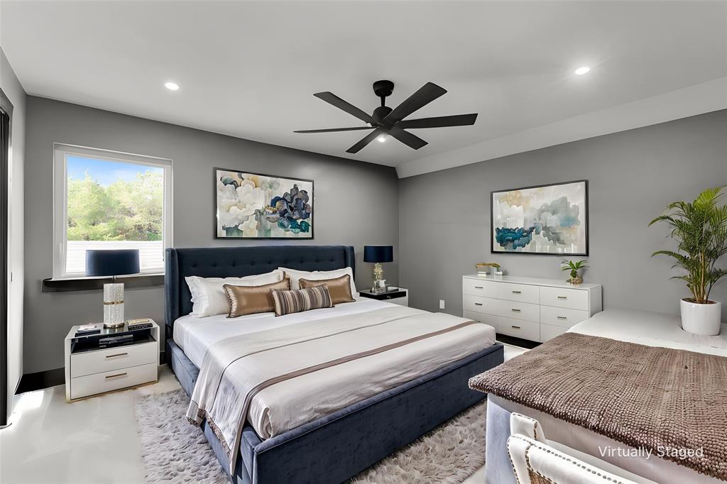7899 County Road 623 Blue Ridge, TX 75424 - Photo 20 of 39 a bedroom with double bed and a large window