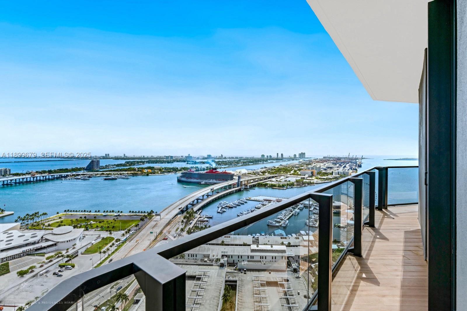 398 Northeast 5th Street, Unit 4409 Miami, FL 33132 - Photo 13 of 30 a view of a balcony with an ocean