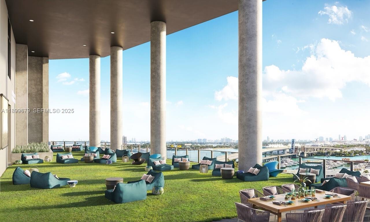 398 Northeast 5th Street, Unit 4409 Miami, FL 33132 - Photo 17 of 30 a view of a garden with lawn chairs