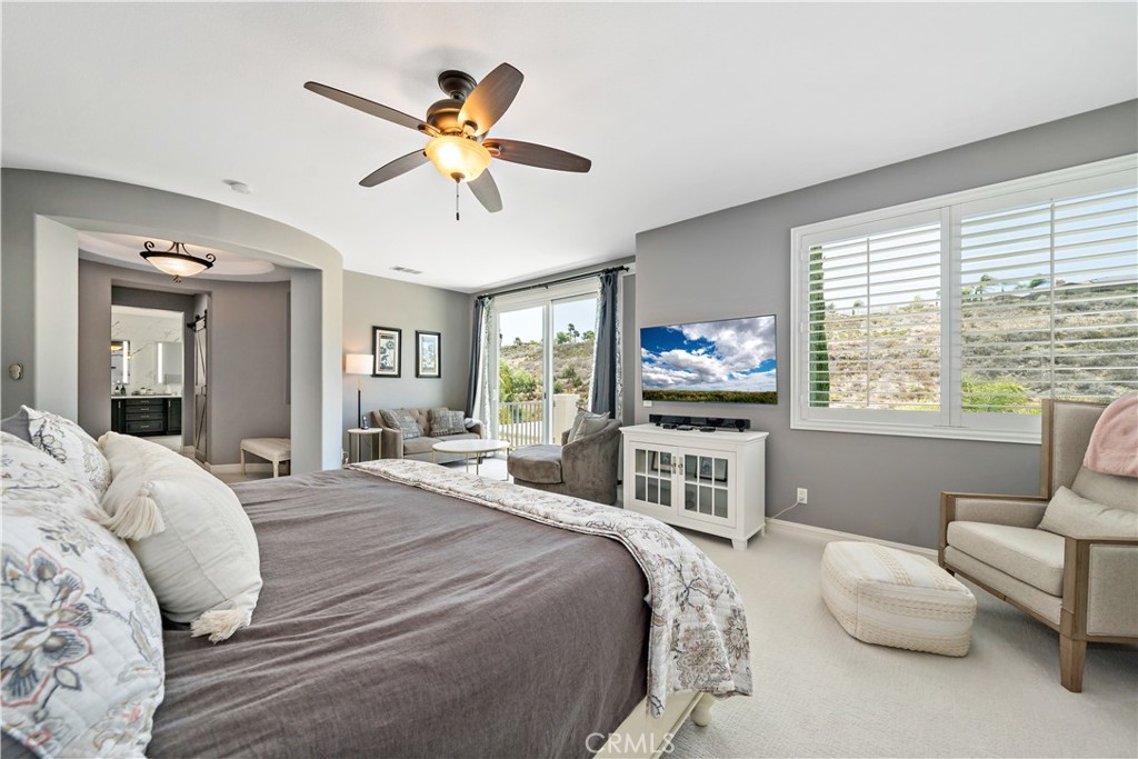 34150 Starpoint Street Temecula, CA 92592 - Photo 35 of 65 a bedroom with a bed and a flat screen tv