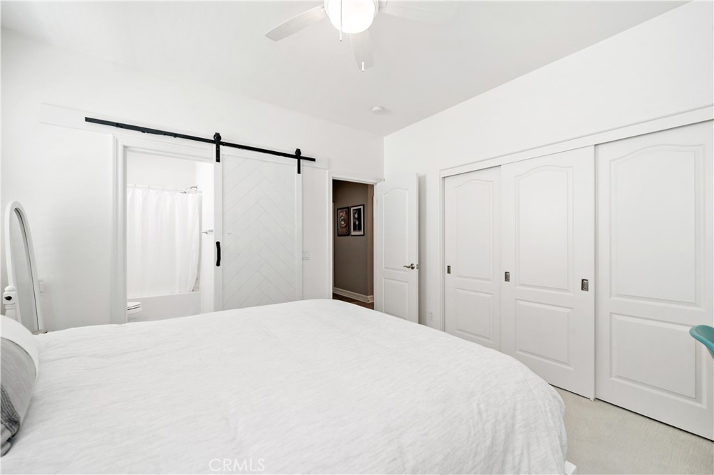 34150 Starpoint Street Temecula, CA 92592 - Photo 41 of 65 a large white bed in a white room