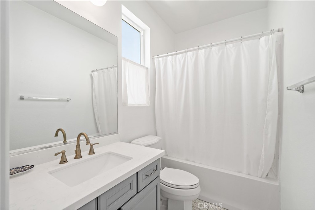 34150 Starpoint Street Temecula, CA 92592 - Photo 42 of 65 a bathroom with a sink toilet and shower
