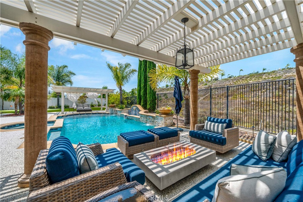 34150 Starpoint Street Temecula, CA 92592 - Photo 50 of 65 a outdoor living space with patio furniture and a potted plant