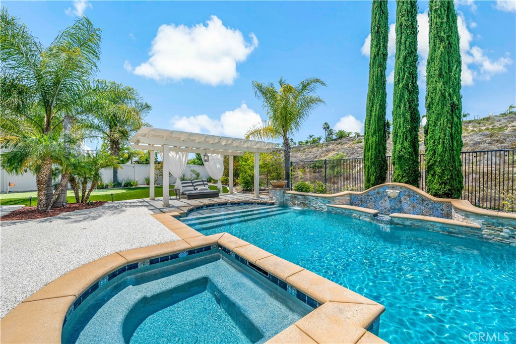 34150 Starpoint Street Temecula, CA 92592 - Photo 56 of 65 a view of swimming pool from a garden