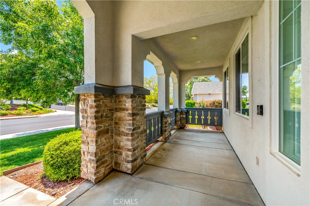 34150 Starpoint Street Temecula, CA 92592 - Photo 6 of 65 a view of a pathway of a house with a porch