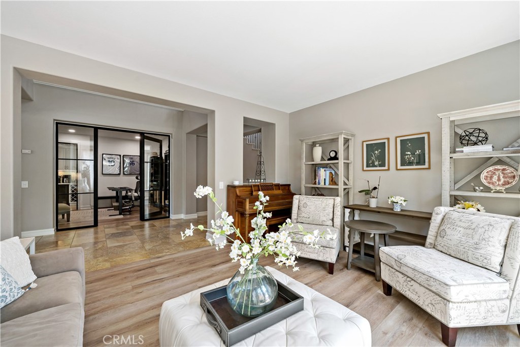 34150 Starpoint Street Temecula, CA 92592 - Photo 10 of 65 a living room with furniture and wooden floor