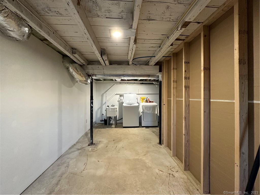 41 Candlewood Drive New Fairfield, CT 06812 - Photo 14 of 16 a view of a hallway with wooden walls