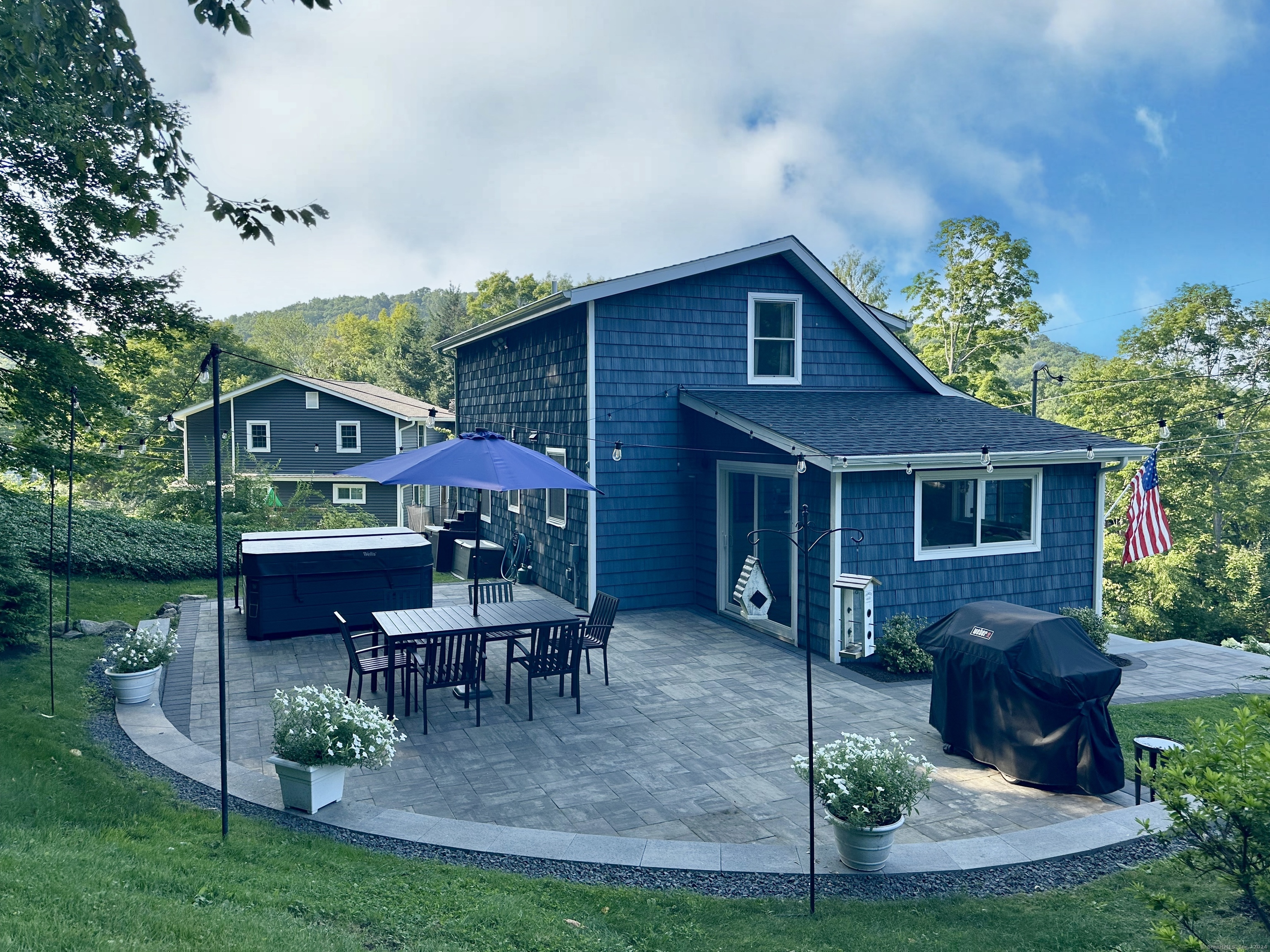 41 Candlewood Drive New Fairfield, CT 06812 - Photo 15 of 16 a view of house with a yard and patio