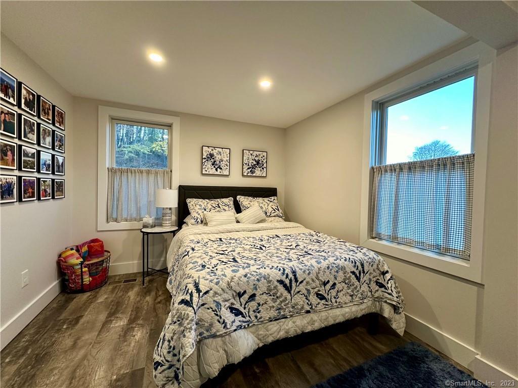 41 Candlewood Drive New Fairfield, CT 06812 - Photo 7 of 16 a bedroom with a bed and a window
