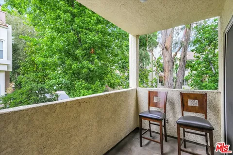 a view of outdoor space with seating area