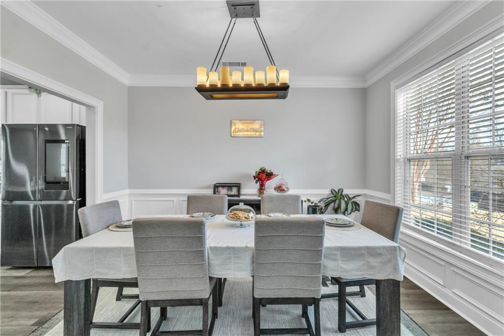 2800 Barimore Place Dacula, GA 30019 - Photo 12 of 51 a dining room with furniture and window