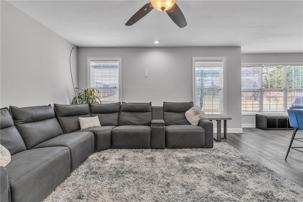 2800 Barimore Place Dacula, GA 30019 - Photo 23 of 51 a living room with furniture and a large window