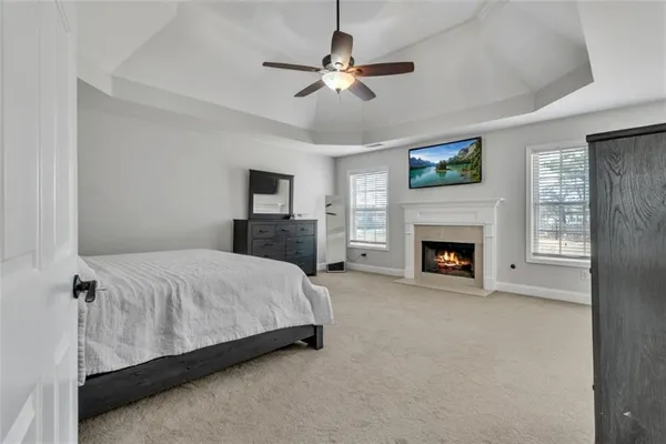 a room with a dresser and a window