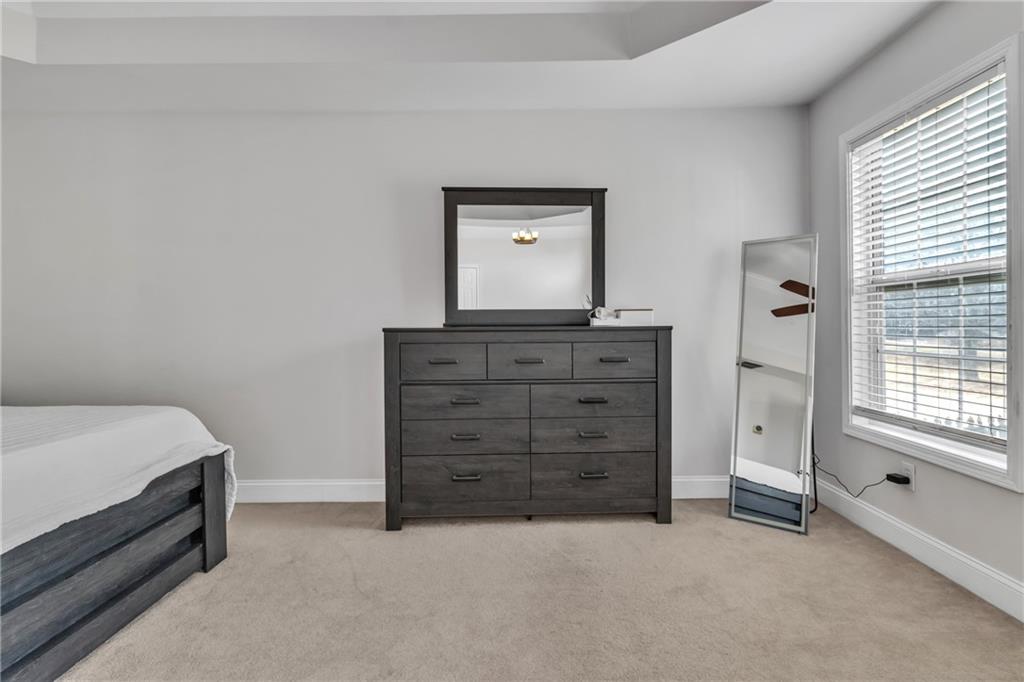 2800 Barimore Place Dacula, GA 30019 - Photo 28 of 51 a room with a dresser and a window