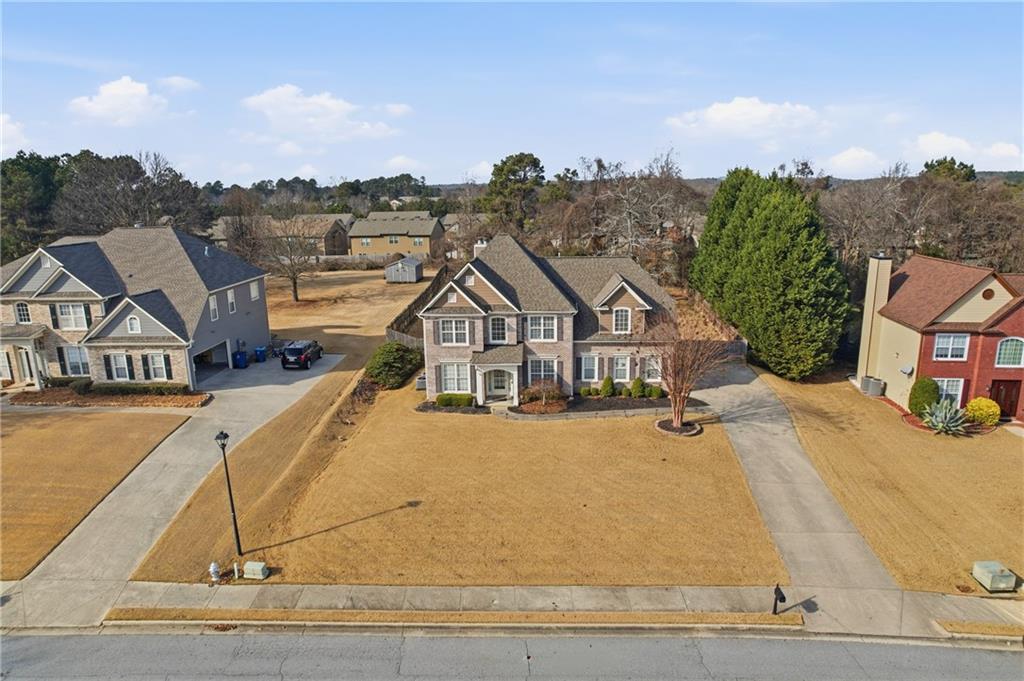 2800 Barimore Place Dacula, GA 30019 - Photo 3 of 51 a view of a house with roof deck