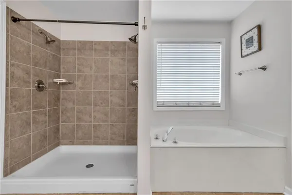 a bedroom with a bed and a book shelf