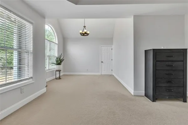 a view of a swimming pool with a lake view