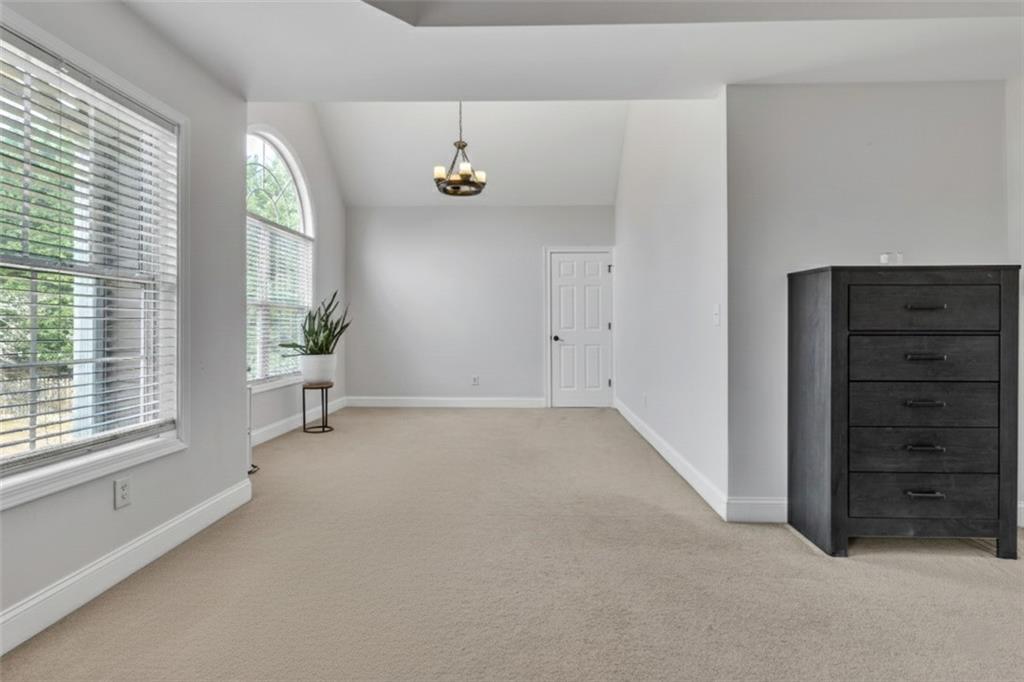 2800 Barimore Place Dacula, GA 30019 - Photo 41 of 51 wooden floor in an empty room with a window