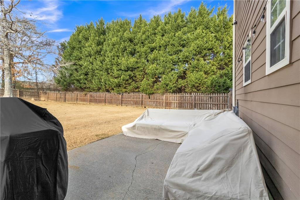 2800 Barimore Place Dacula, GA 30019 - Photo 45 of 51 a view of a swimming pool with a lake view