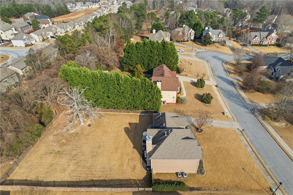2800 Barimore Place Dacula, GA 30019 - Photo 5 of 51 an aerial view of residential houses with outdoor space