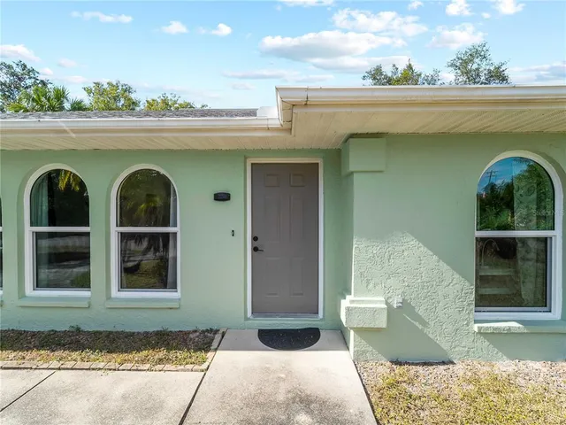 a front view of a house with windows