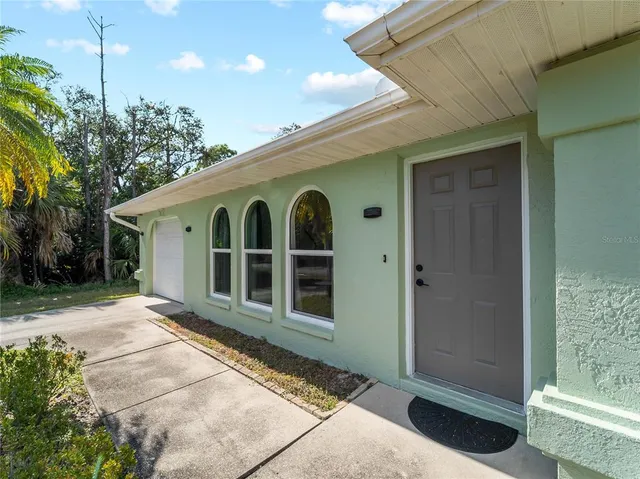 a front view of a house with a porch