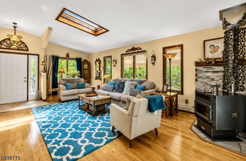 11 Rippling Brook Drive Vernon, NJ 07422 - Photo 6 of 49 a living room with fireplace furniture and a flat screen tv