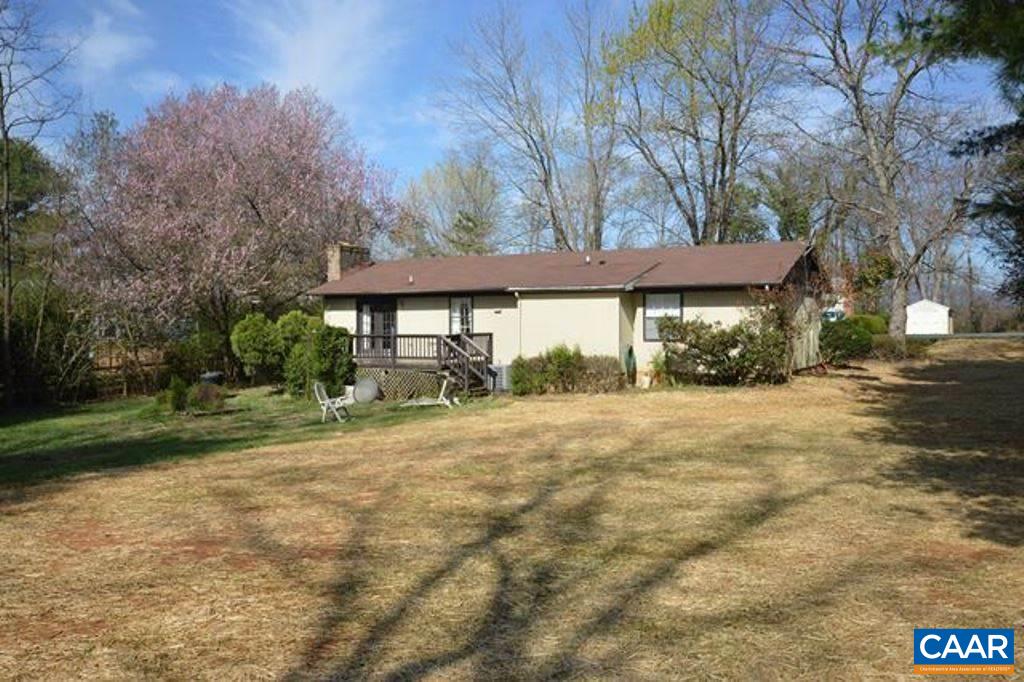 88 Pinewood Court Ruckersville, VA 22968 - Photo 5 of 22 a house with trees in front of it