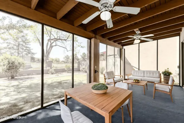 an aerial view of residential house with outdoor space and swimming pool