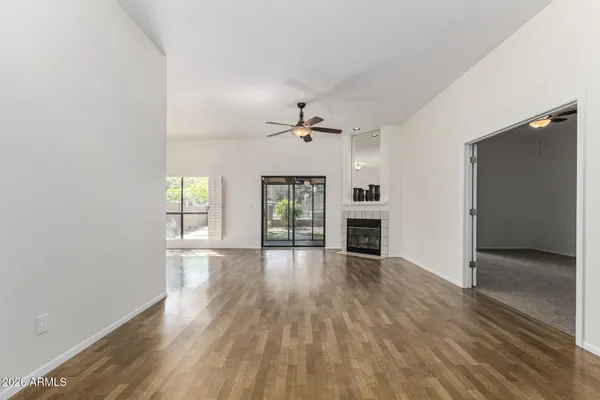 a kitchen with stainless steel appliances granite countertop a sink and a white cabinets