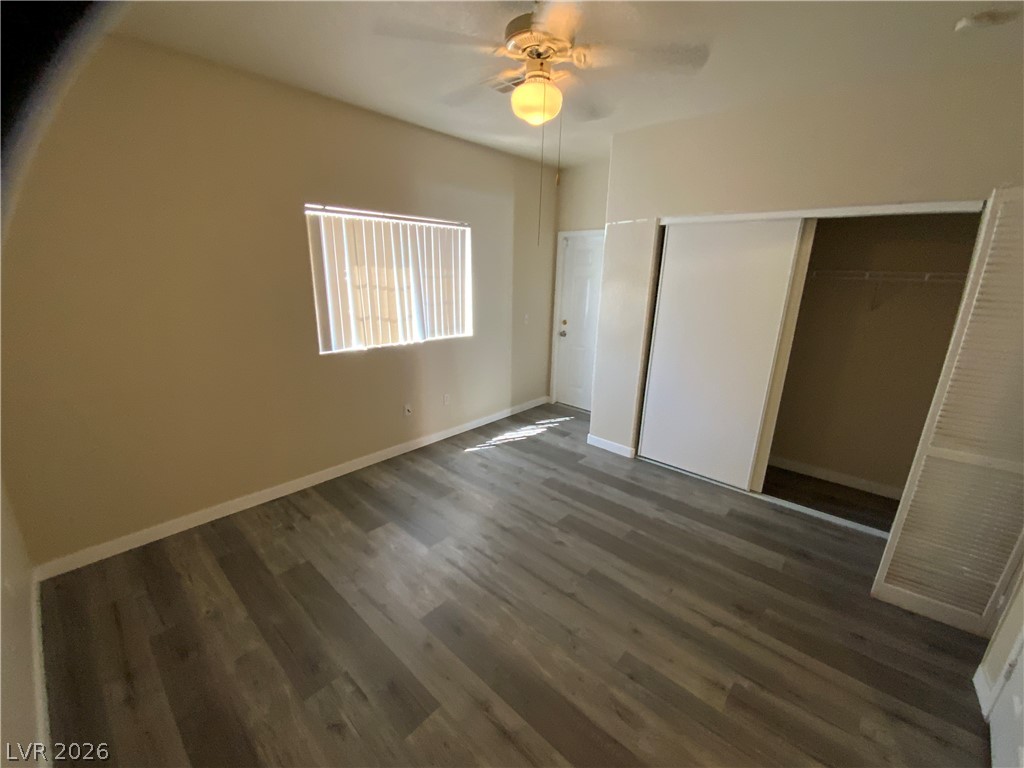 4730 East Craig Road, Unit 1154 Las Vegas, NV 89115 - Photo 13 of 13 Laminate wood flooring and a convenient closet define this accommodating sleeping space.