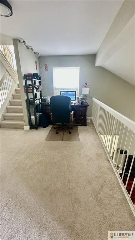 238 Nebula Road, Unit 238 Piscataway, NJ 08854 - Photo 13 of 22 a view of a livingroom with furniture and staircase