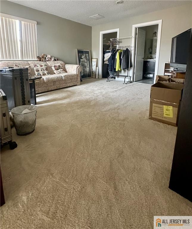 238 Nebula Road, Unit 238 Piscataway, NJ 08854 - Photo 20 of 22 a living room with furniture and a flat screen tv