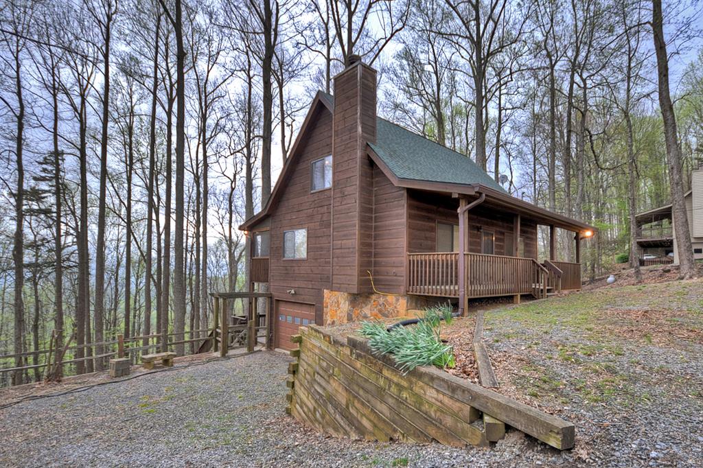 1285 Walnut Ridge Ellijay, GA 30536 - Photo 1 of 38 a backyard of a house with lots of green space