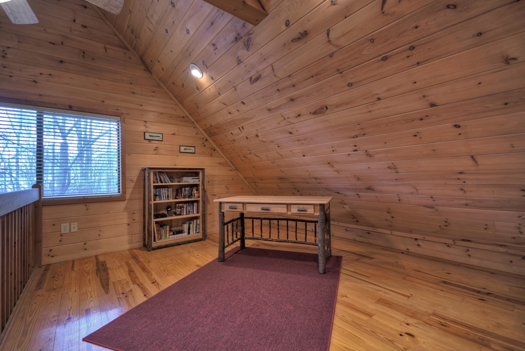 1285 Walnut Ridge Ellijay, GA 30536 - Photo 22 of 38 wooden floor in an empty room with a window