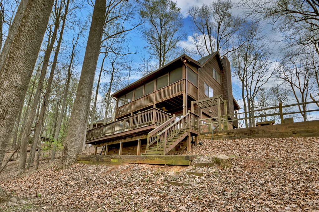 1285 Walnut Ridge Ellijay, GA 30536 - Photo 36 of 38 a front view of a house with a yard