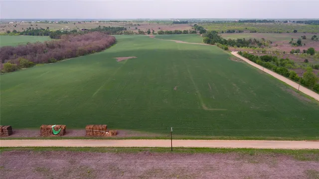 a view of a field with sitting space