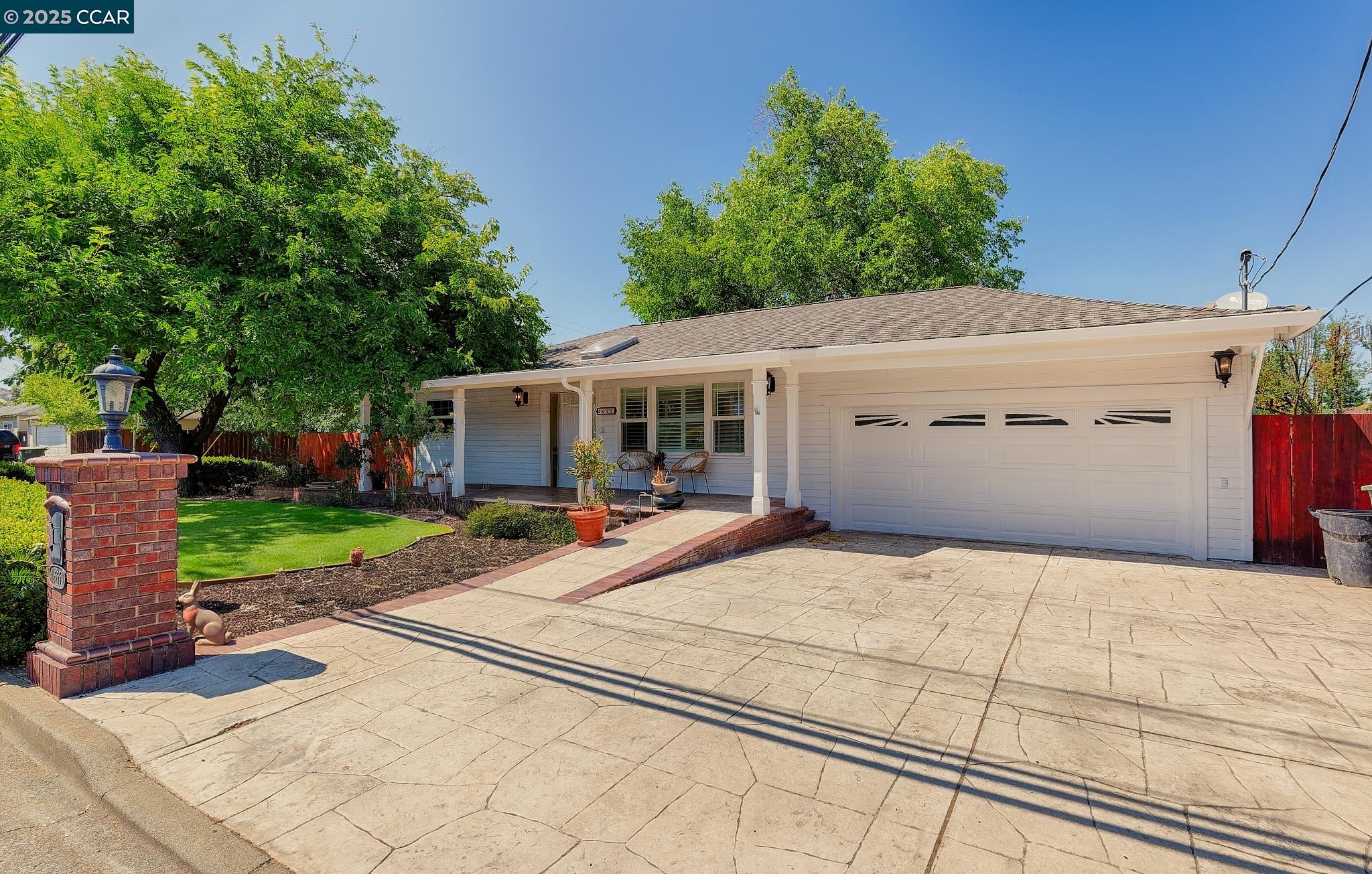 1555 Ayers Road Concord, CA 94521 - Photo 1 of 1 a house with yard in front of it