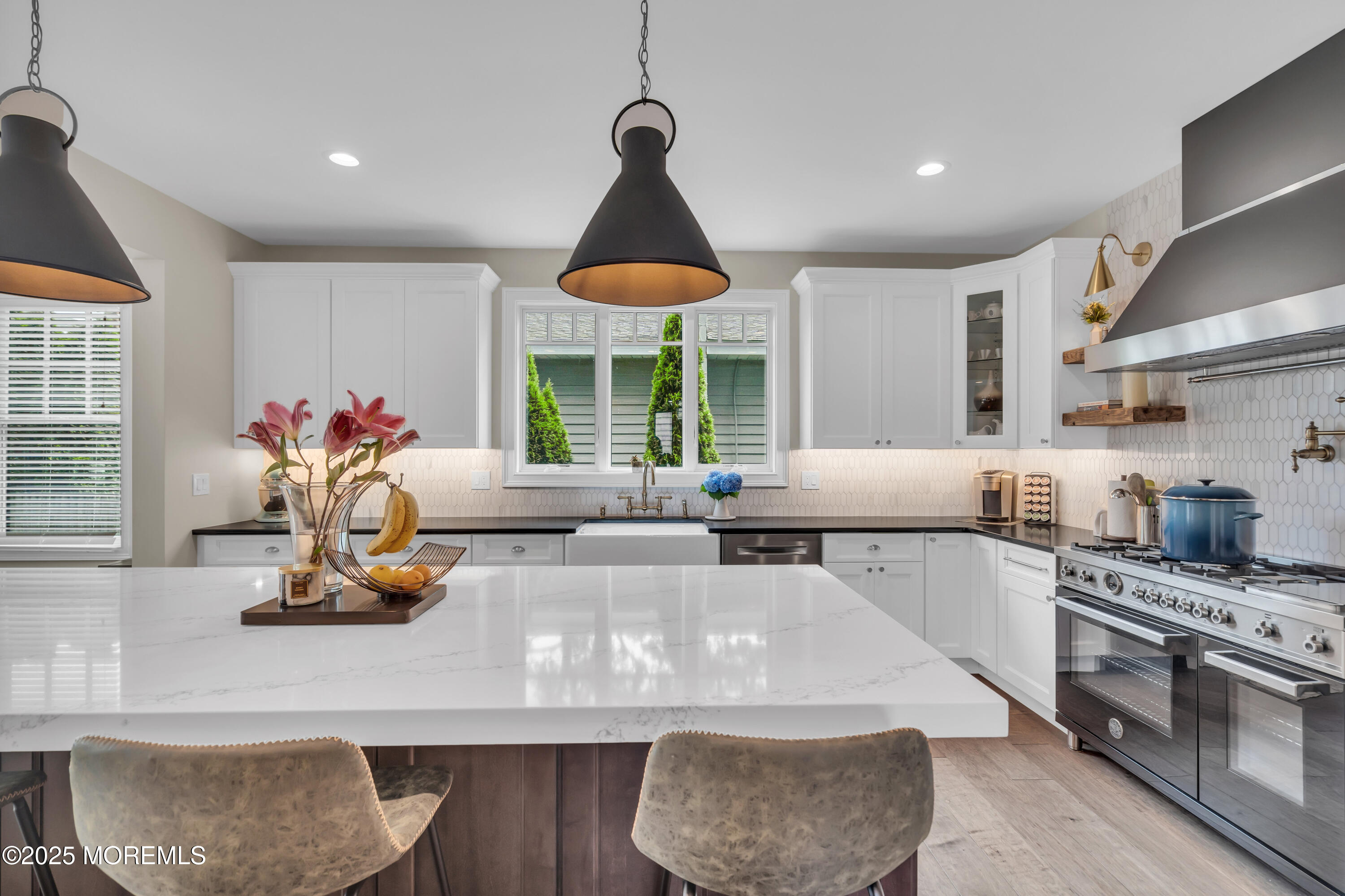 2118 Edgewood Place Spring Lake, NJ 07762 - Photo 16 of 67 a kitchen with stainless steel appliances granite countertop a stove and a white cabinets