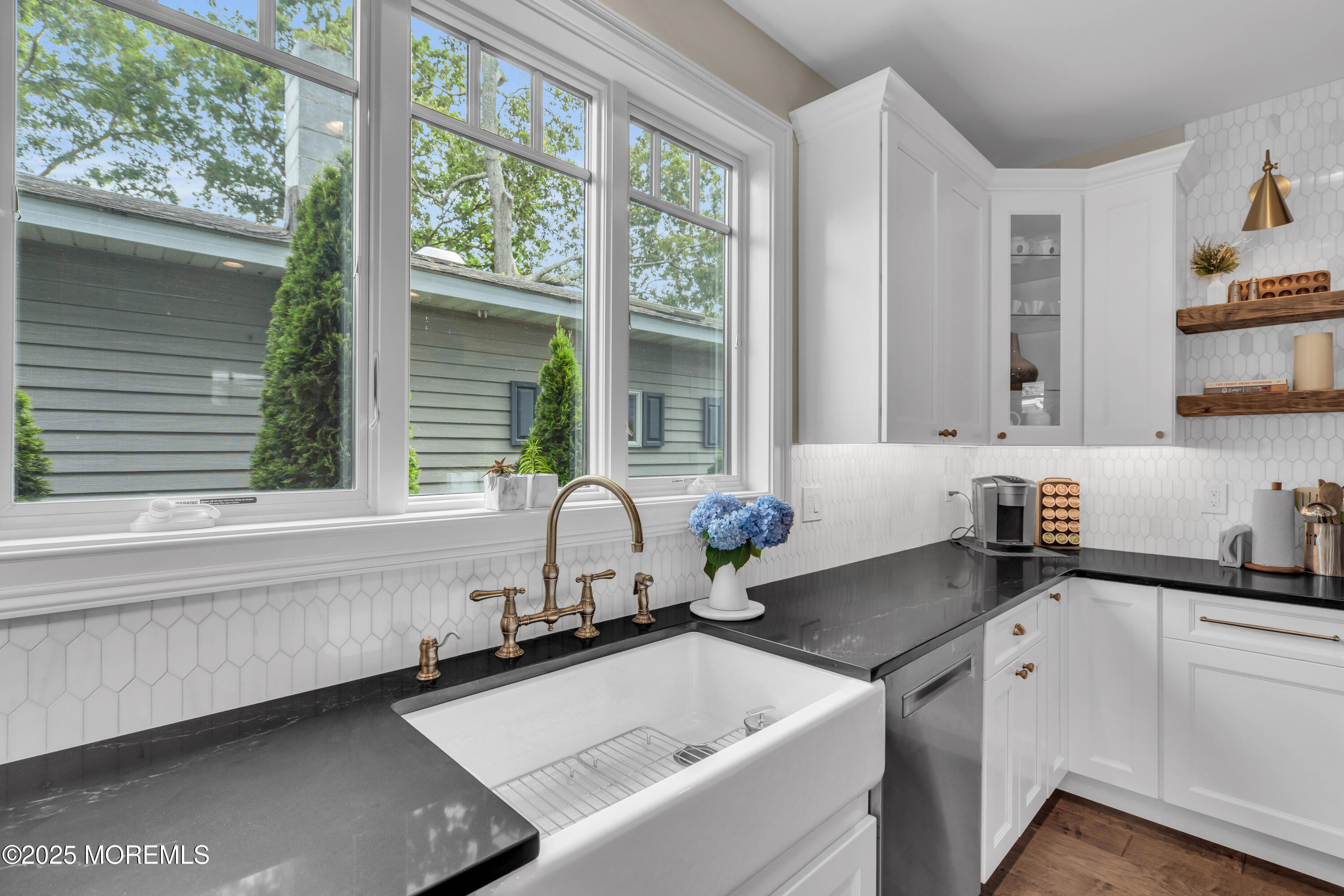 2118 Edgewood Place Spring Lake, NJ 07762 - Photo 19 of 67 a kitchen with a sink and a large window