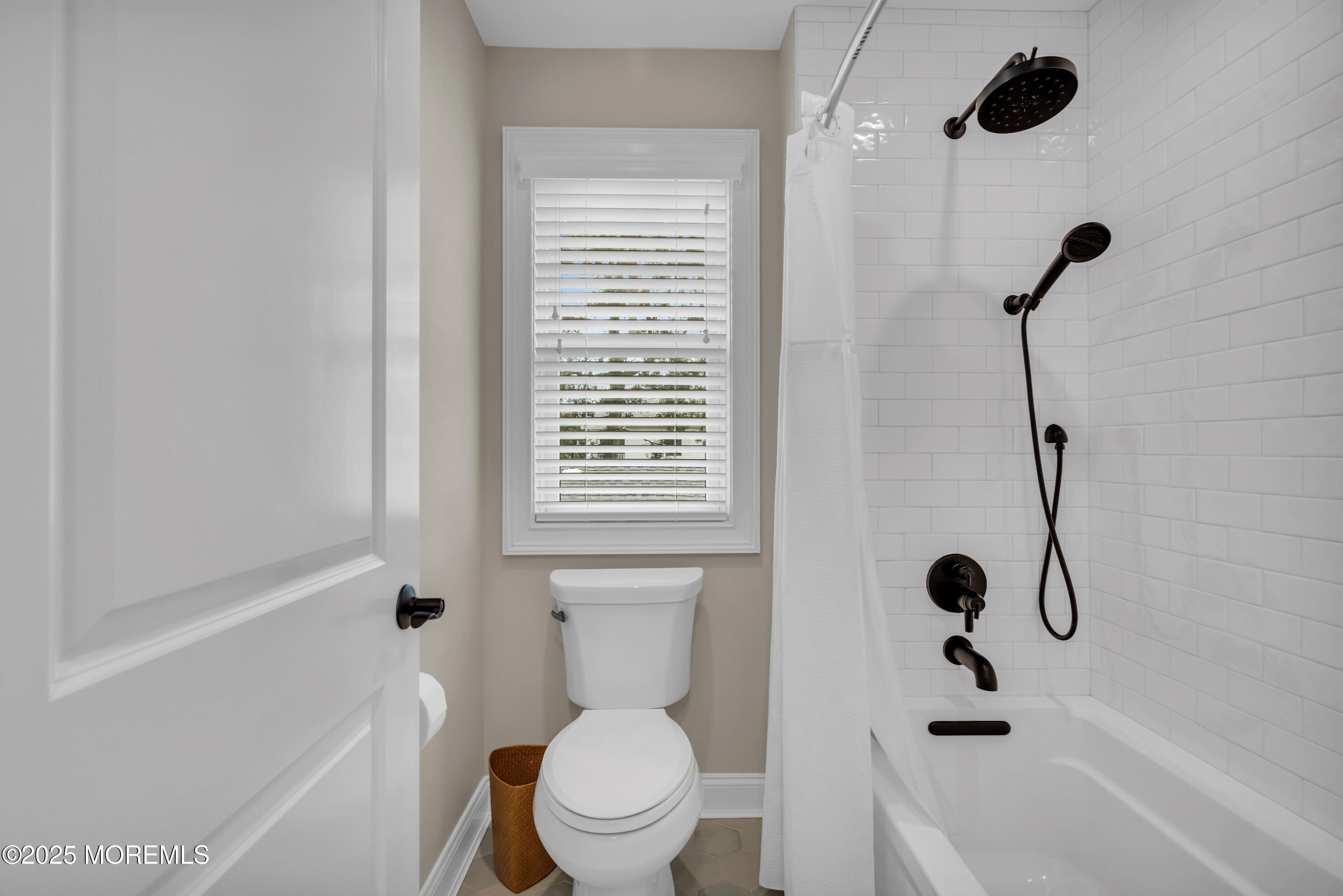 2118 Edgewood Place Spring Lake, NJ 07762 - Photo 19 of 67 a bathroom with a sink a toilet and a bathtub