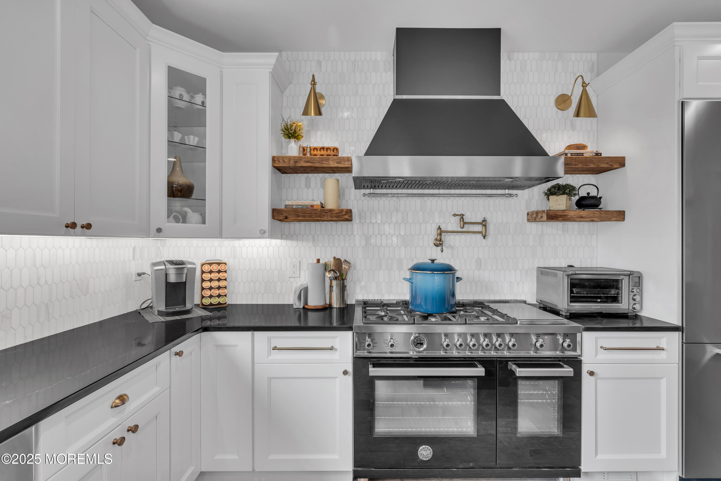 2118 Edgewood Place Spring Lake, NJ 07762 - Photo 20 of 67 a kitchen with a stove and a white cabinets