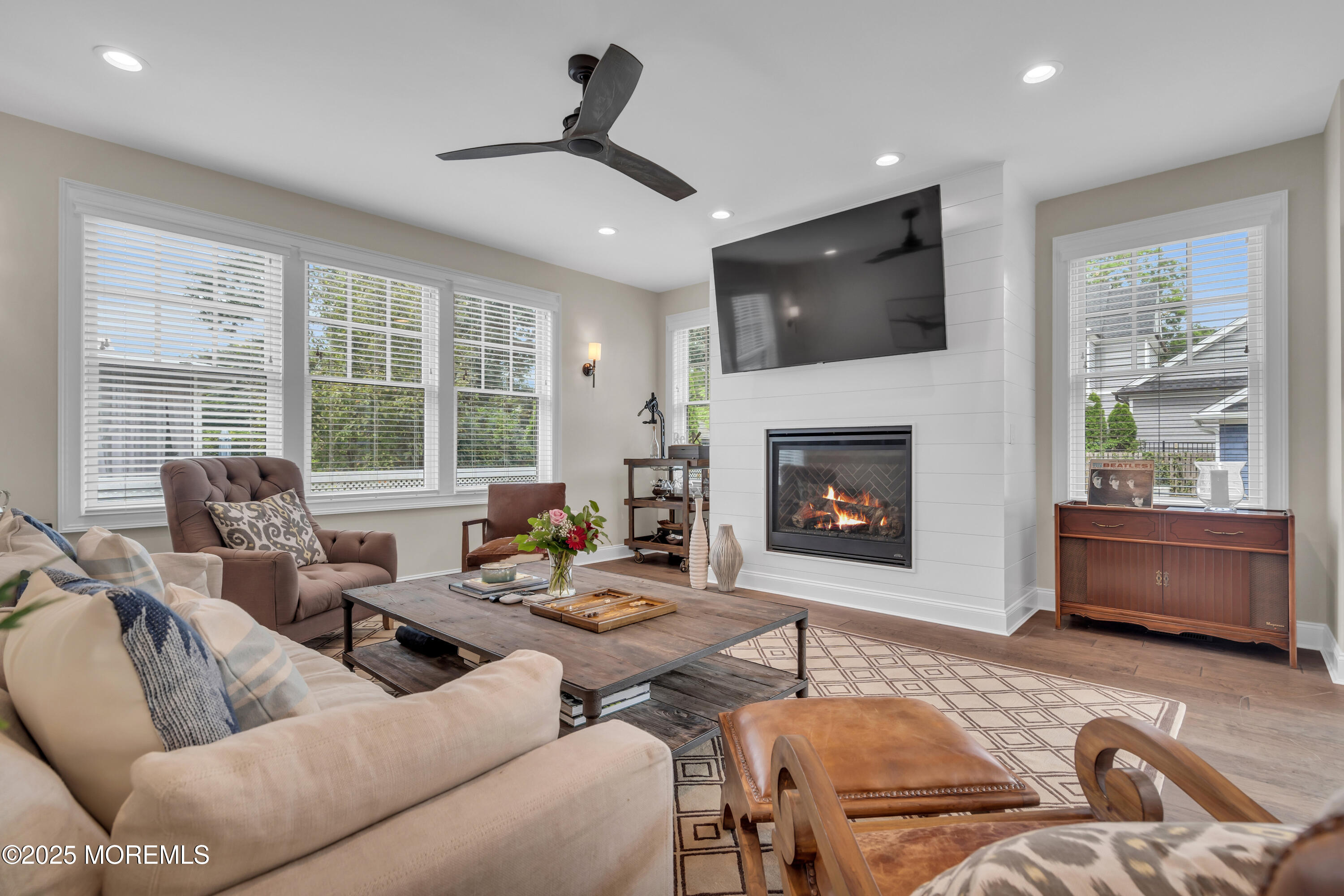 2118 Edgewood Place Spring Lake, NJ 07762 - Photo 26 of 67 a living room with furniture and a fireplace