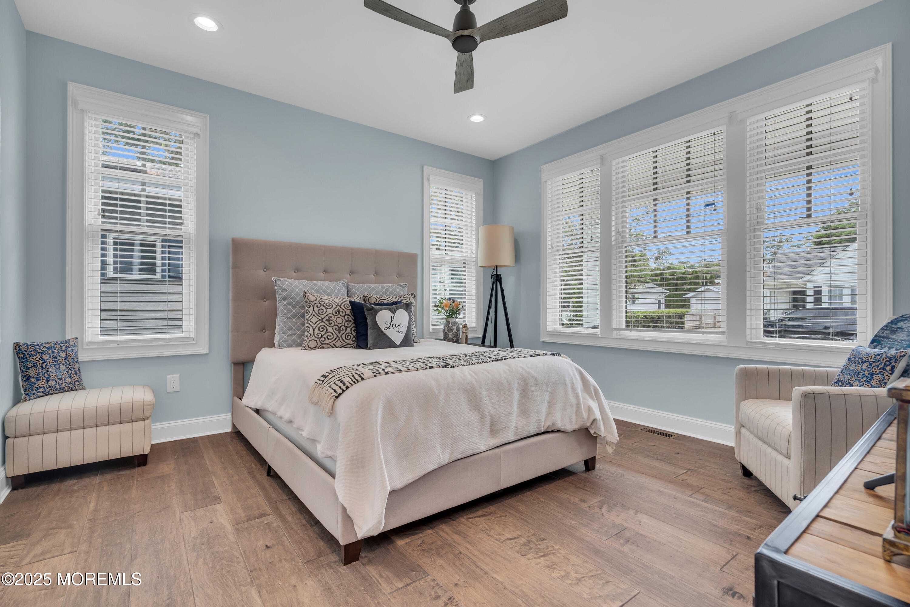2118 Edgewood Place Spring Lake, NJ 07762 - Photo 29 of 67 a bedroom with a large bed couch and windows